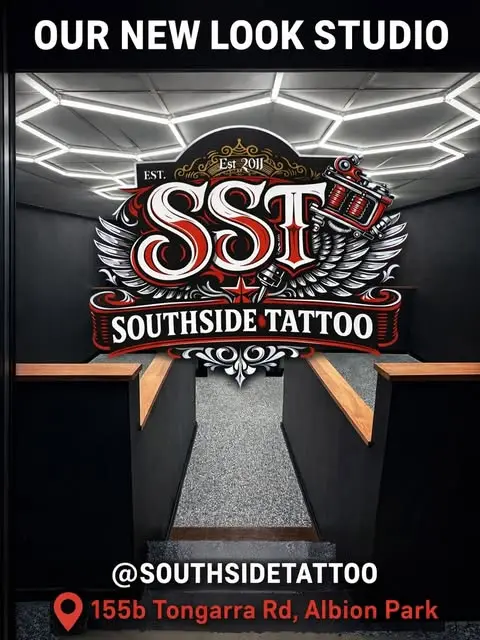 Announcement post for the new look Southside Tattoo studio, showing the chrome SST wall sign at 155b Tongarra Rd